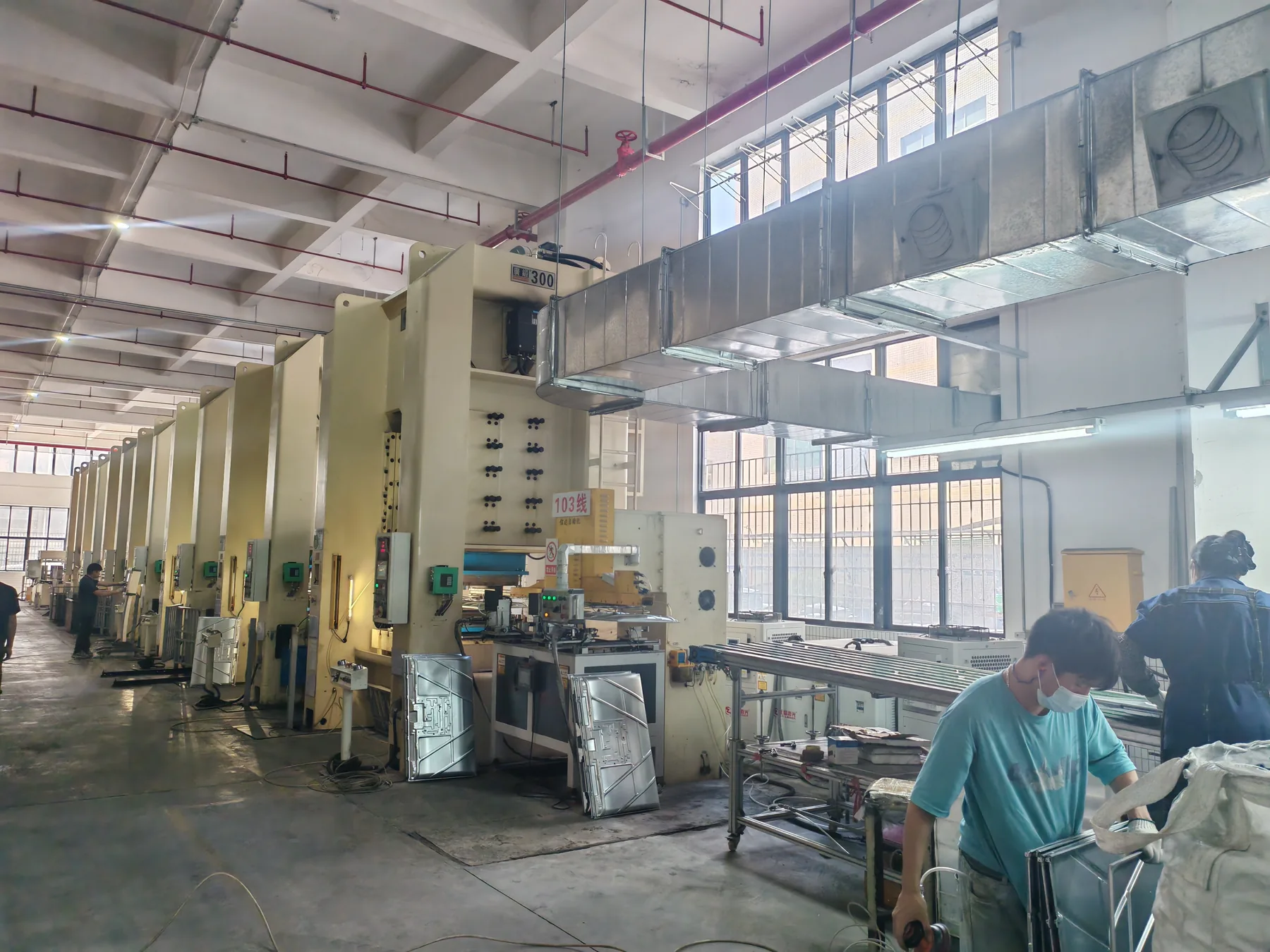 Metal stamping line 103